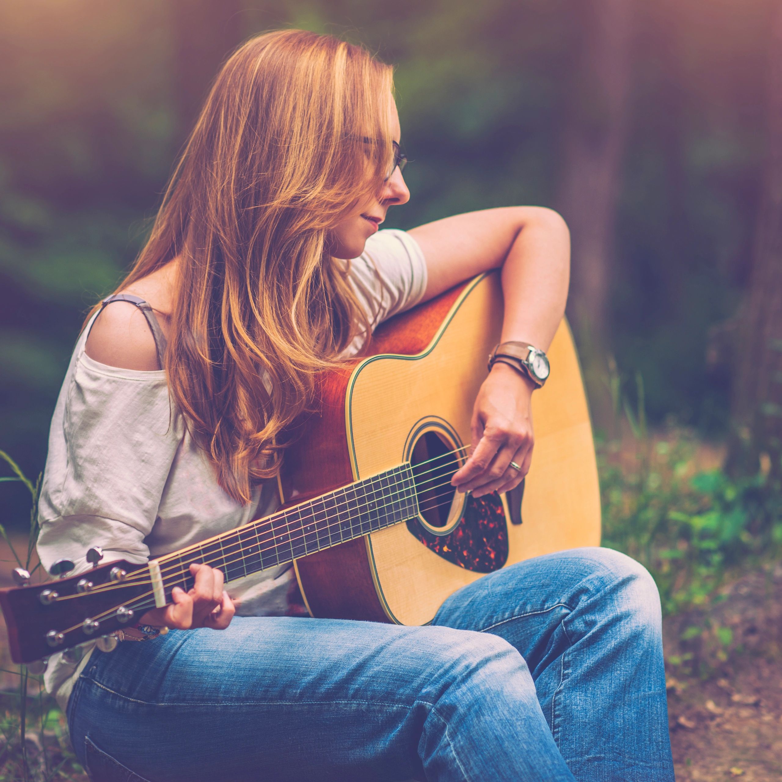Musician portrait holding a guitar